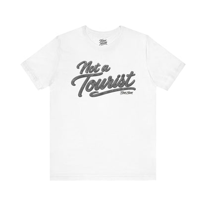 Knox Nixon NOT A TOURIST Dark script graphic T-shirt in white
