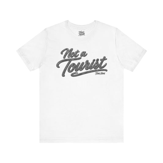 Knox Nixon NOT A TOURIST Dark script graphic T-shirt in white