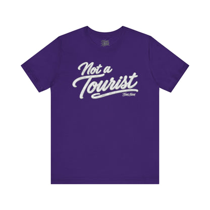 Knox Nixon NOT A TOURIST retro script graphic T-shirt in purple
